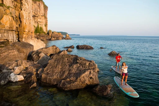 California Dreamin': Must-Try Hobby for an Unforgettable Summer!
Summer is the perfect time to step out of your comfort zone and delve into new experiences.
Stand-Up Paddle Boarding (SUP) is an increasingly popular watersport that combines fitness with a close-to-nature experience. Ideal for those who love water activities, SUP is a full-body workout that improves balance, strength, and endurance.
With its tranquil azure waters and scenic views of the surrounding mountains, Lake Tahoe is the perfect place to give this hobby a go. Local outfitters, such as Tahoe Paddle & Oar, offer paddleboard rentals and lessons for beginners. Paddling through the crystalline water with the Sierra Nevada's peaks reflected around you is an unforgettable experience. Getting into this can also be a good gateway into other exciting water activities like wakeboarding or surfing.