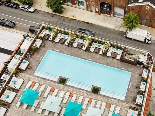 Discover the Glamorous Rooftop Pool Overlooking the NYC Skyline in Williamsburg