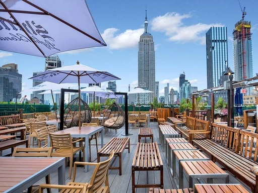 Discover the iconic 230 Fifth Rooftop Bar in NYC! 🌇🍹