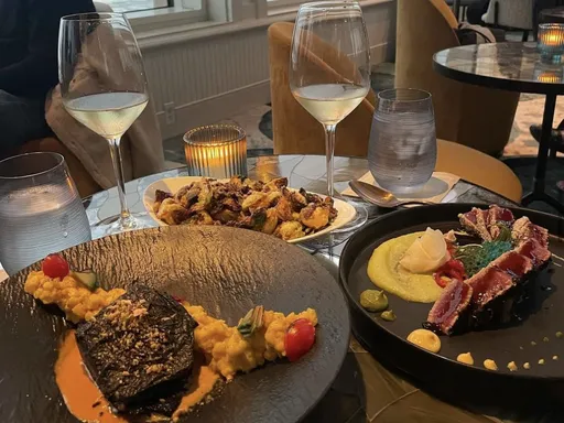 A very big thank you to The Marine Room for making my birthday celebration unforgettable 🎂
Dining here was a true culinary journey. From the breathtaking ocean views to the impeccable service, every moment was magical.
Here’s some of what we tasted during our experience:
-PERUVIAN CRUDO: Bluefin tuna elevated with aji amarillo agua chile, mint, cilantro, and a boba crisp for added texture.
-KING SALMON: A decadent dish featuring wagyu fat sous vide carrot, coconut salsa macha, huitlacoche, and cassis chayote, a symphony of flavors.
-TRUFFLE YUCA FRIES with parmigiano reggiano
-CRISPY BRUSSELS SPROUTS: The perfect accompaniments, adding a touch of indulgence to our meal.
Your exquisite cuisine and warm hospitality made it an occasion i will cherish forever!! Here’s to many more memorable moments at this stunning dining destination! 🎉