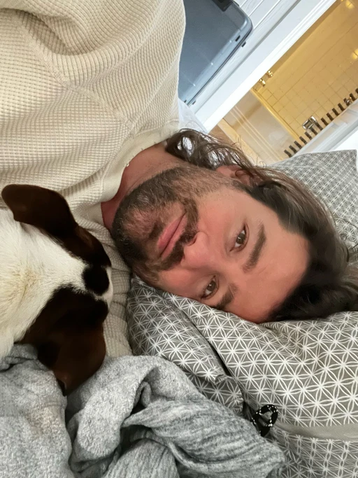 Laying around with a Boston terrier named Ocho