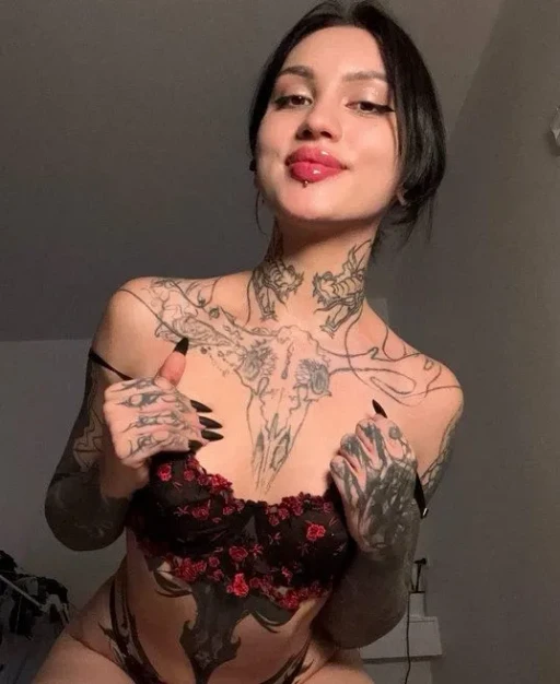 I think if a girl has a lot of tattoos, it makes her a bit prettier, doesn't it?