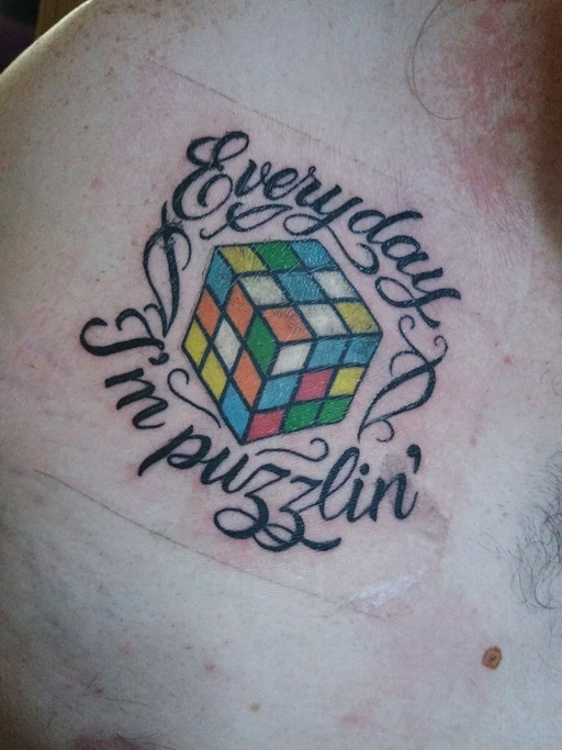 so I did a thing, I recently got a new tattoo because I love rubiks cubes. I have a giant collection of all shapes and sizes. I'm a huge nerd and love the puzzle aspect of it. yes, it is solvable too if anyone was wondering